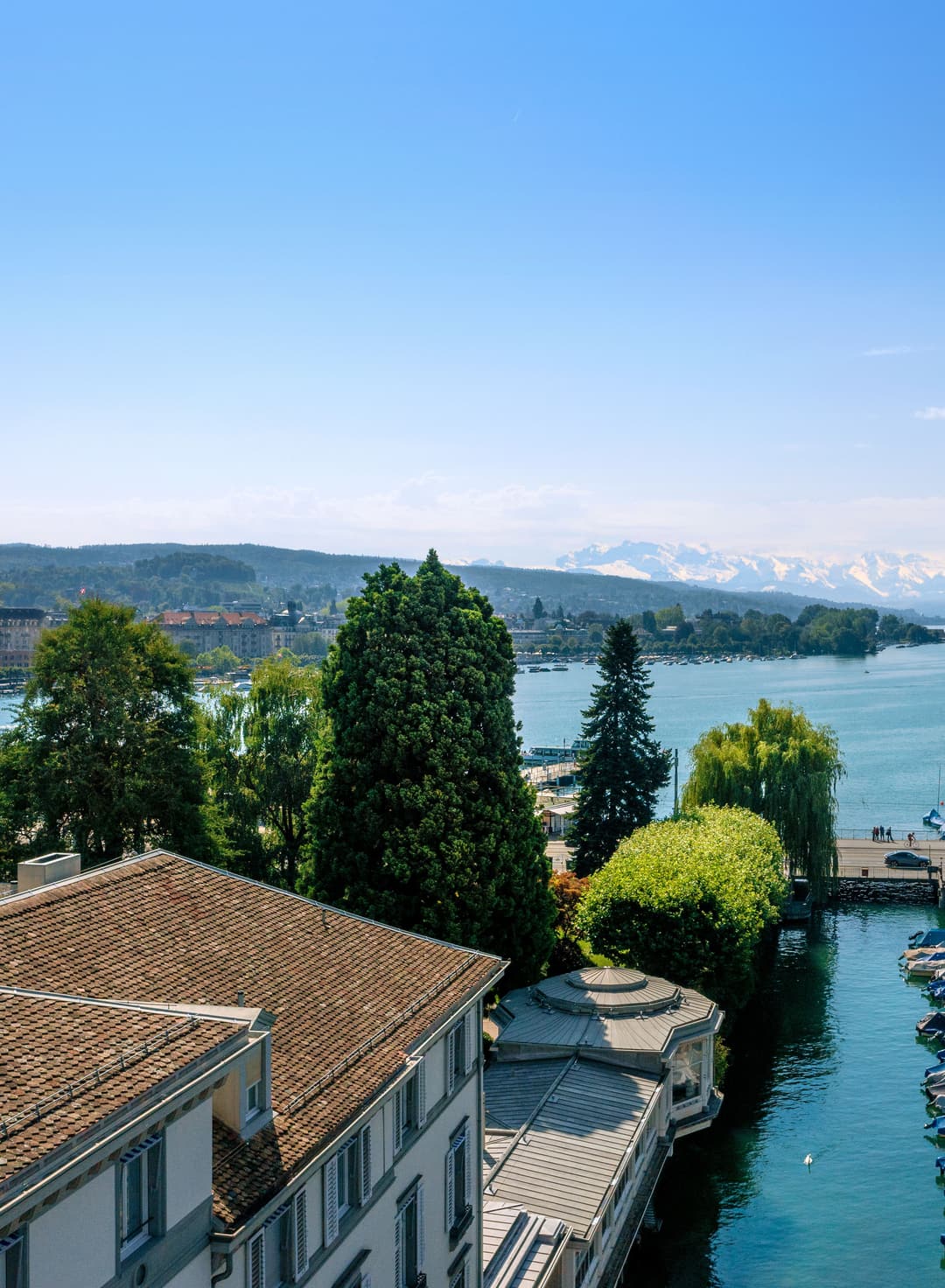 View across Baur au Lac's park toward Lake Zurich