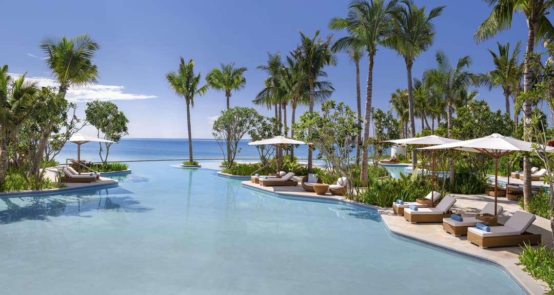 Swimming pool at Waldorf Astoria Maldives Ithaafushi, Raa Atoll