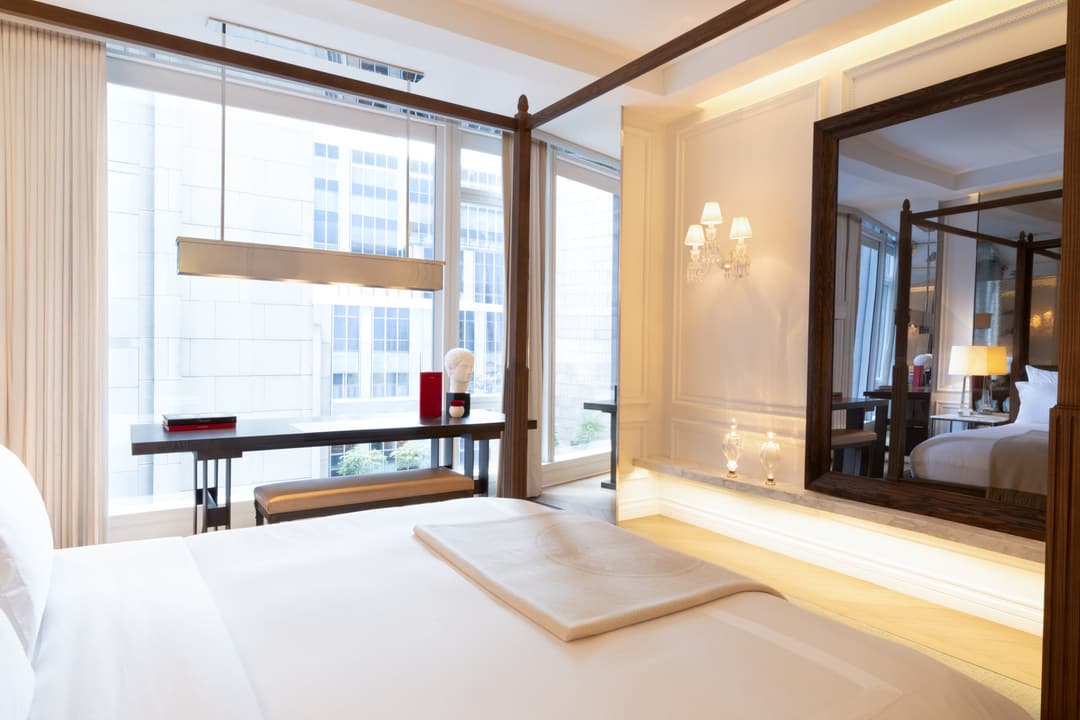 Baccarat New York Suite bedroom with working area
