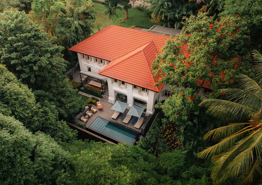 A colonial manor with its private pool among the trees, Capella Singapore