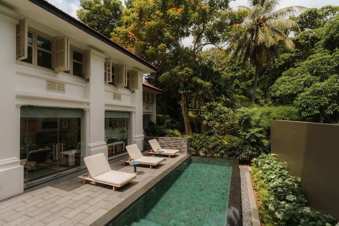 The pool of a Colonial Manor, Capella Singapore