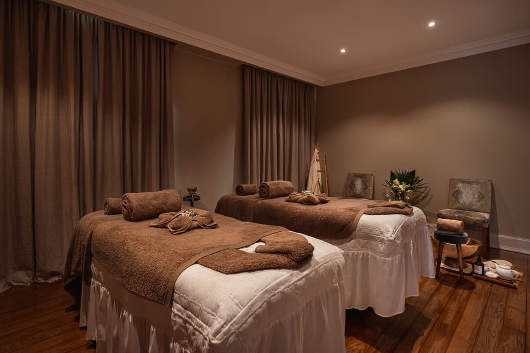 Serene massage therapy room with twin beds at Verride Santa Catarina, Verride Palacio de Santa Catarina