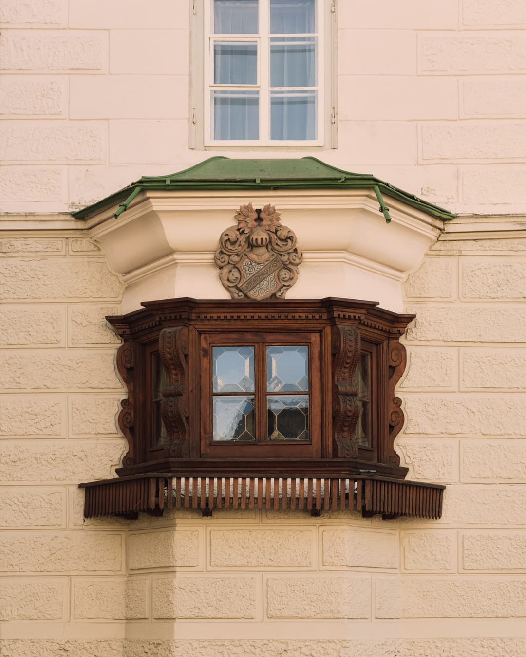 Historic window of the Gredig Stübli at Grand Hotel Kronenhof in Pontresina