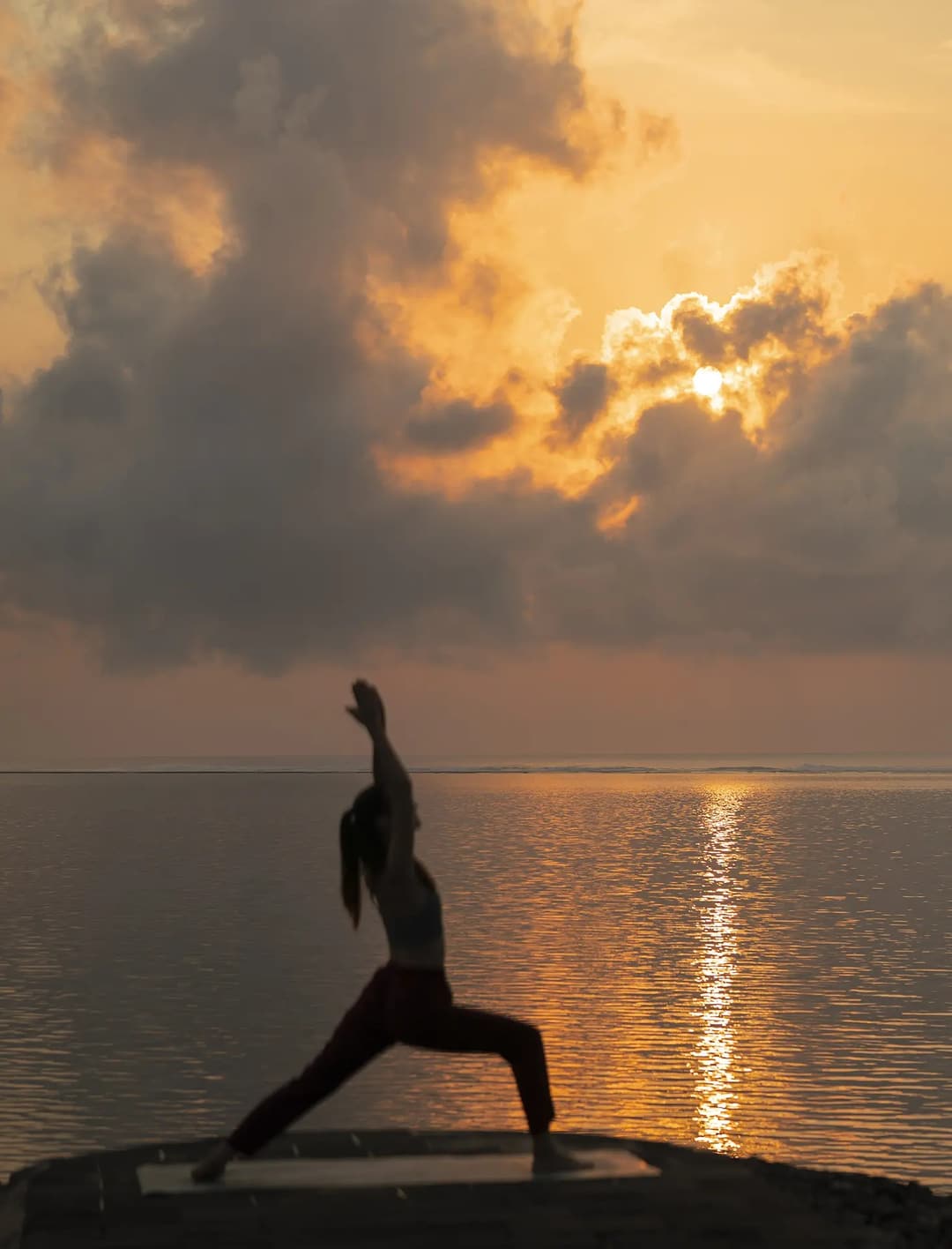 Yoga at sunrise on Geger Beach, The Mulia, Nusa Dua